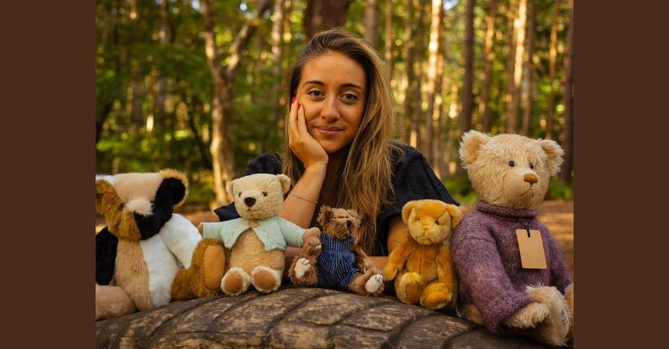 image shows the owner of loved before smiling with teddies