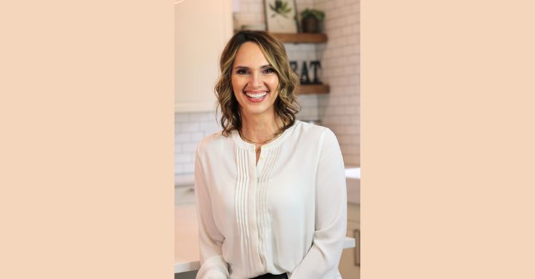 image shows tracy smiling at the camera